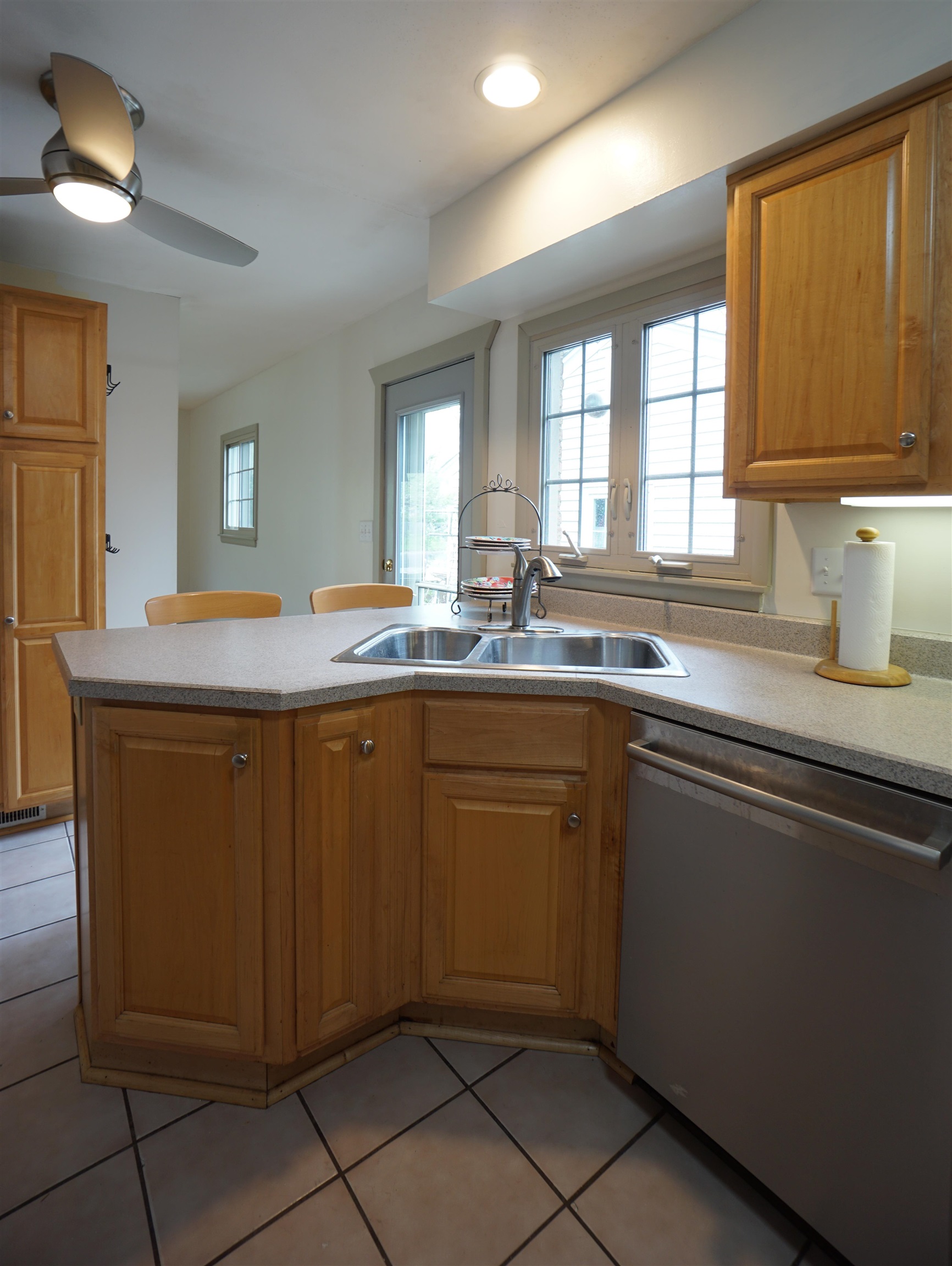 4819 Highcrest Road Rockford, IL 61107 - Photo 13 of 31 a kitchen with cabinets and chandelier