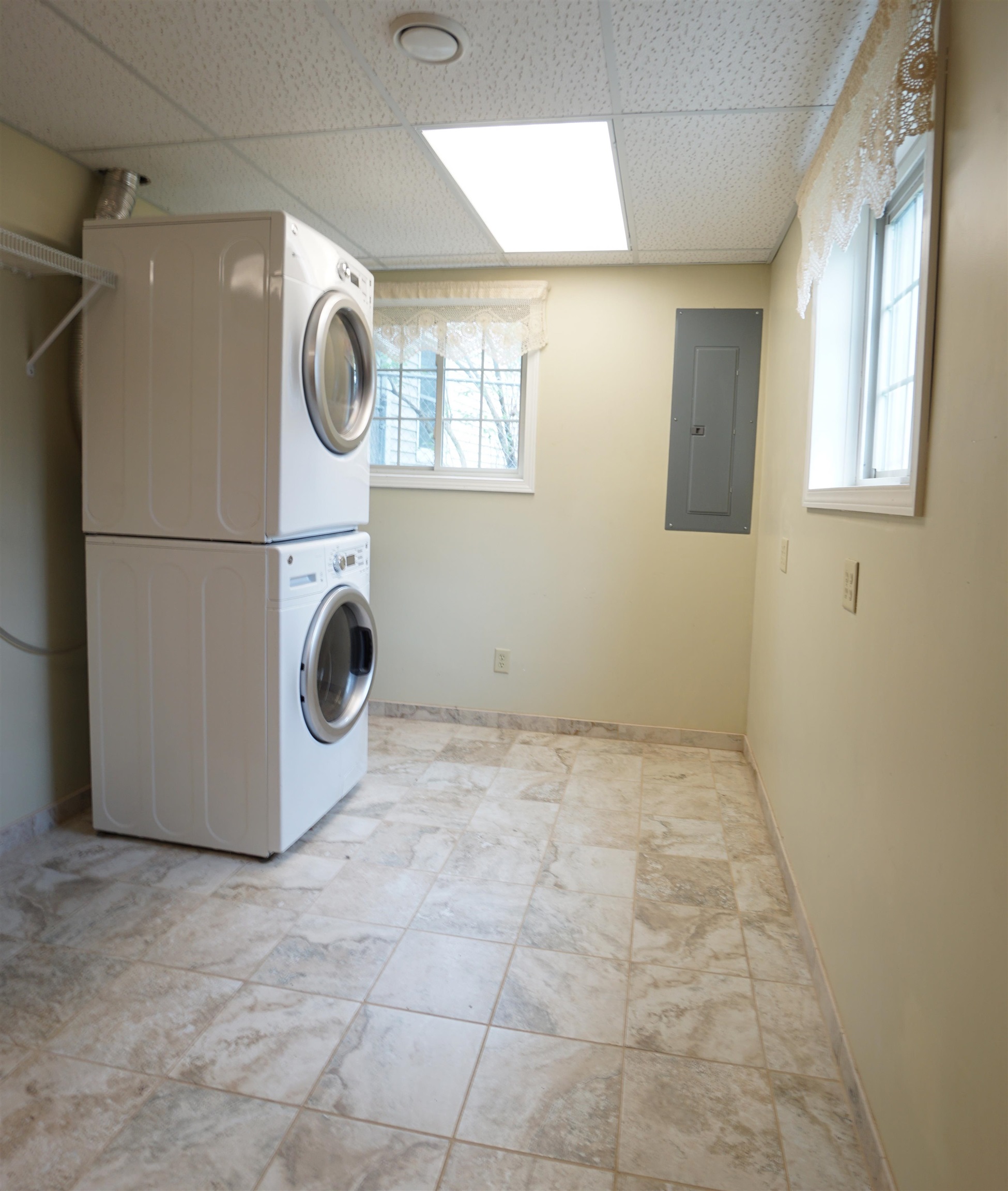 4819 Highcrest Road Rockford, IL 61107 - Photo 30 of 31 a view of a storage & utility room with washer and dryer