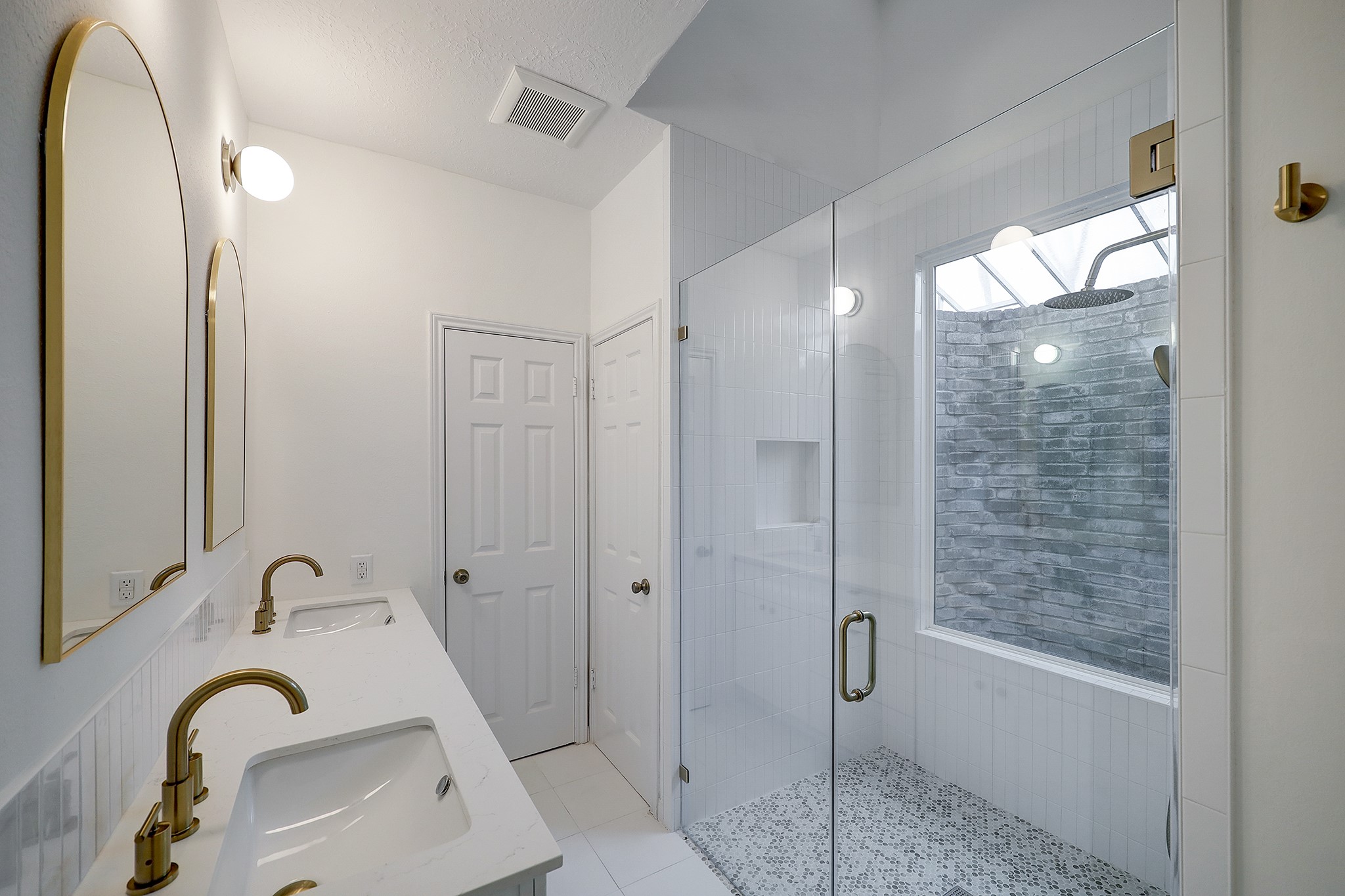 4311 Westheimer Road Houston, TX 77027 - Photo 12 of 23 a bathroom with a sink and shower