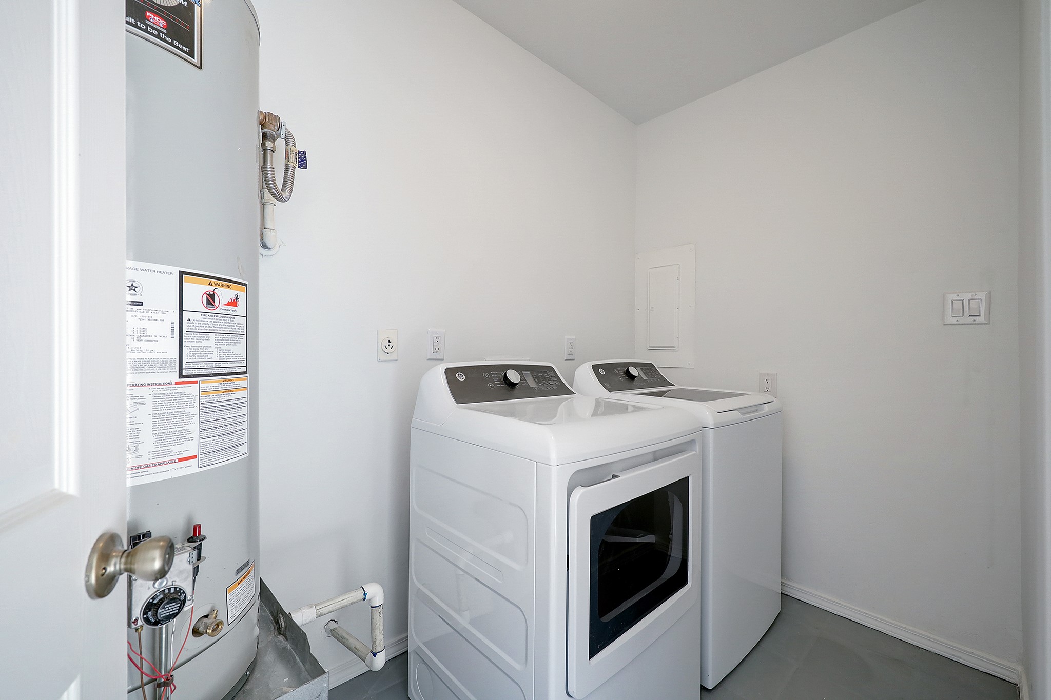 4311 Westheimer Road Houston, TX 77027 - Photo 19 of 23 a utility room with dryer and washer