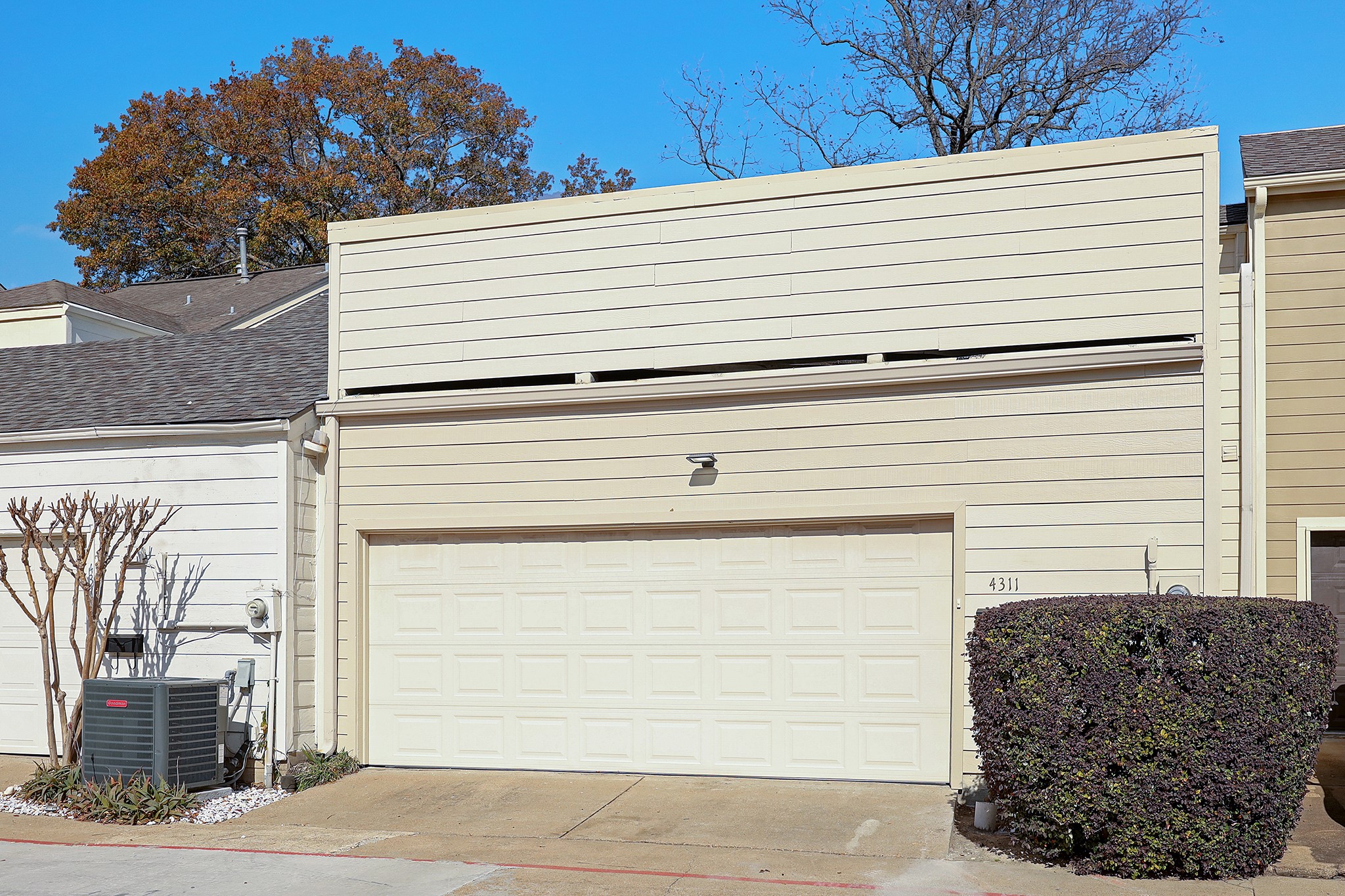 4311 Westheimer Road Houston, TX 77027 - Photo 22 of 23 a view of a house with a garage
