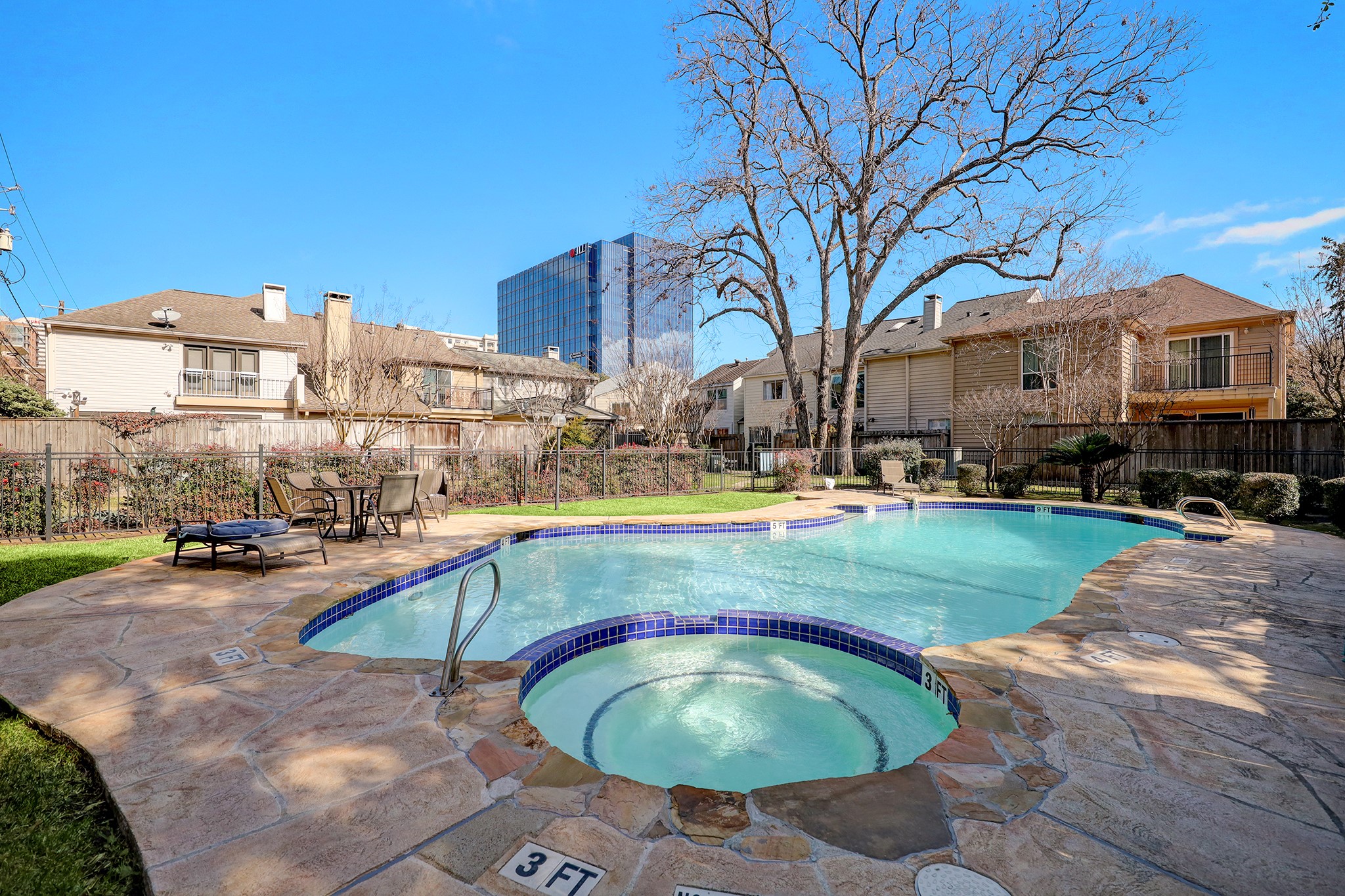 4311 Westheimer Road Houston, TX 77027 - Photo 23 of 23 a swimming pool with outdoor seating and yard