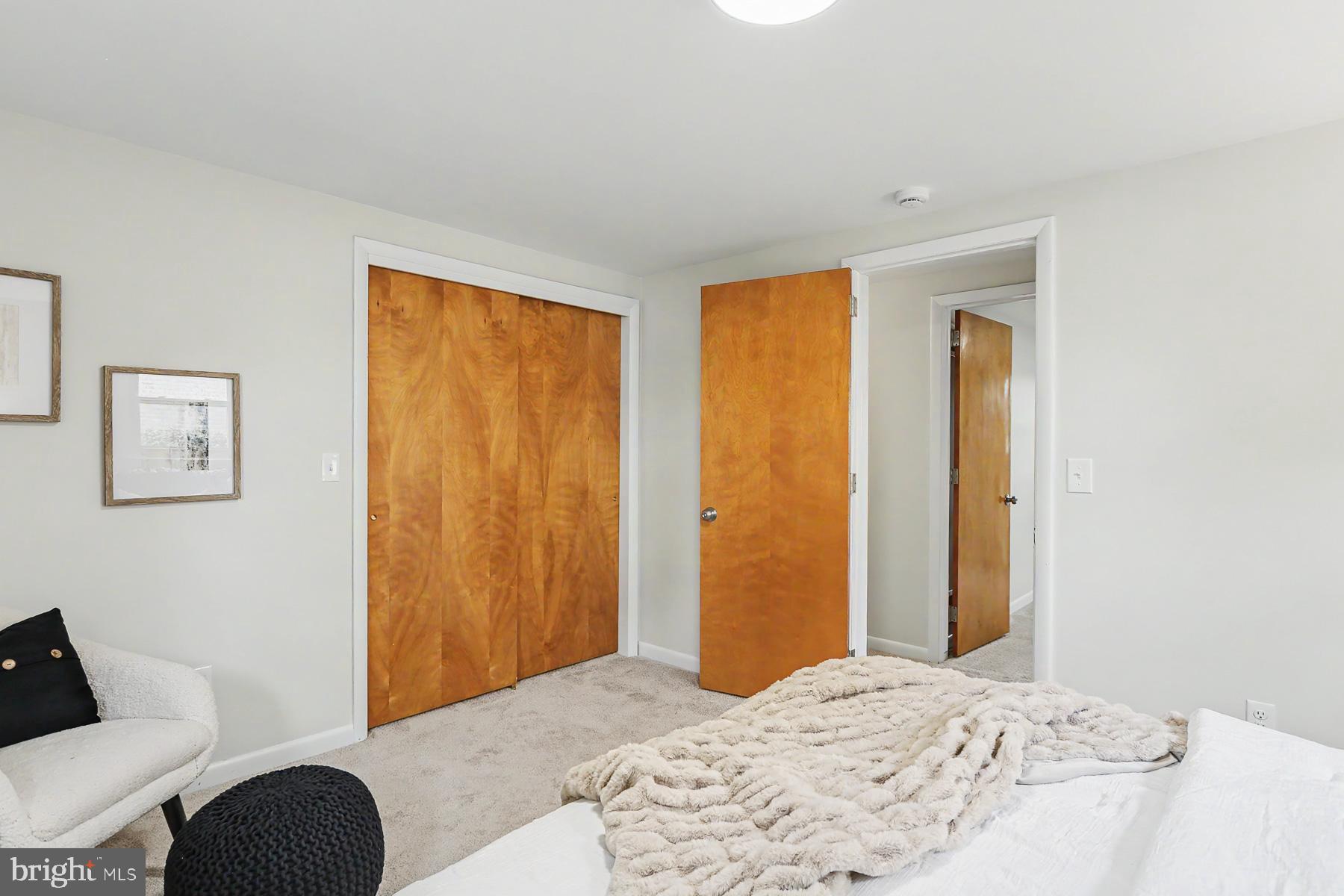 802 Willow Lane Lebanon, PA 17046 - Photo 17 of 23 a bedroom with a bed and a couch