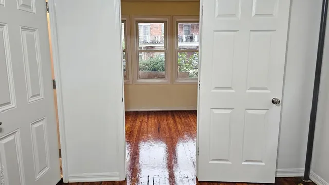 a view of a room that has a window in it