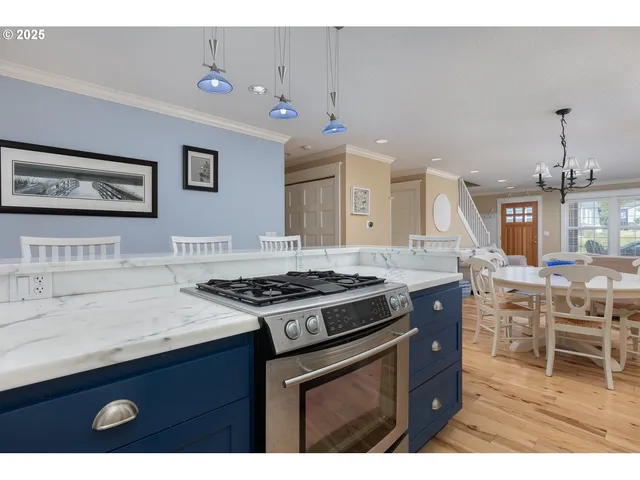 a kitchen with a stove and cabinets