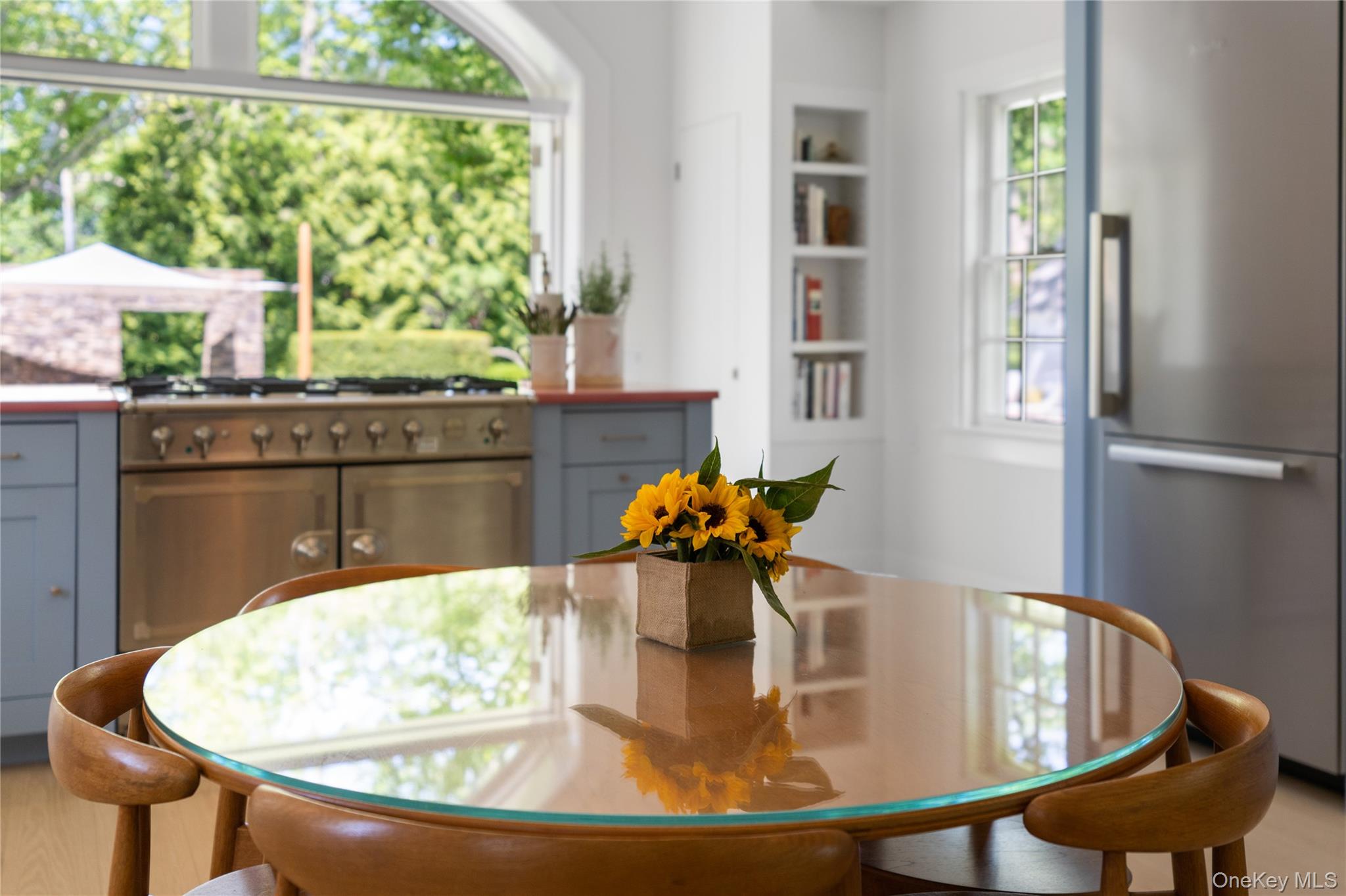 182 Church Lane Bridgehampton, NY 11932 - Photo 11 of 37 a dining room with a table and chairs