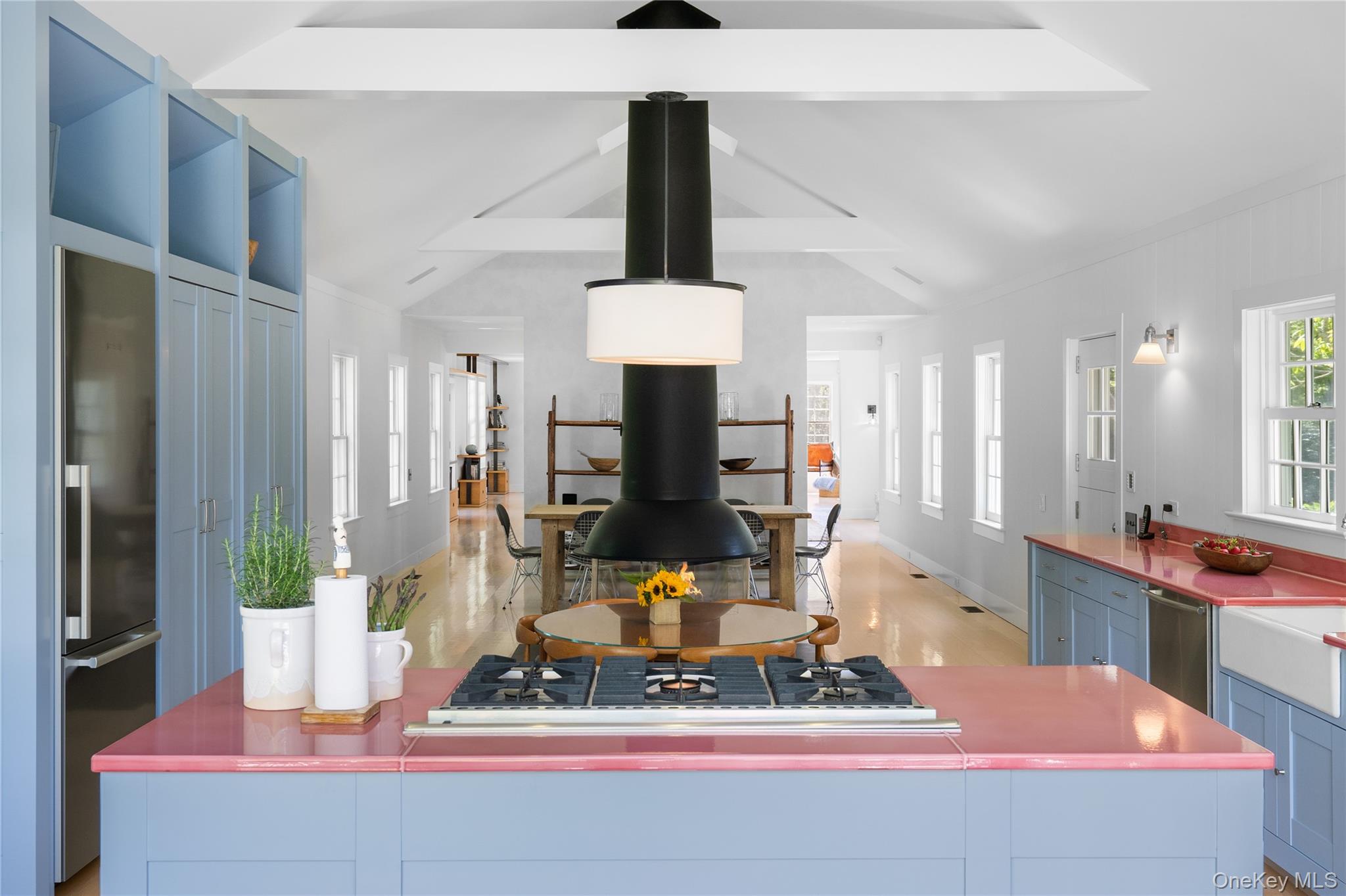 182 Church Lane Bridgehampton, NY 11932 - Photo 13 of 37 a living room with table and chairs