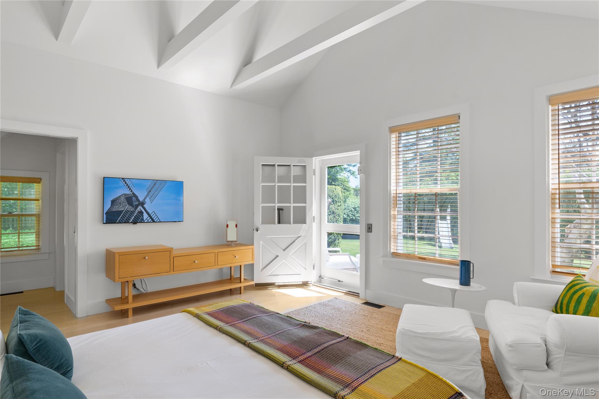 182 Church Lane Bridgehampton, NY 11932 - Photo 20 of 37 a bedroom with furniture and a window