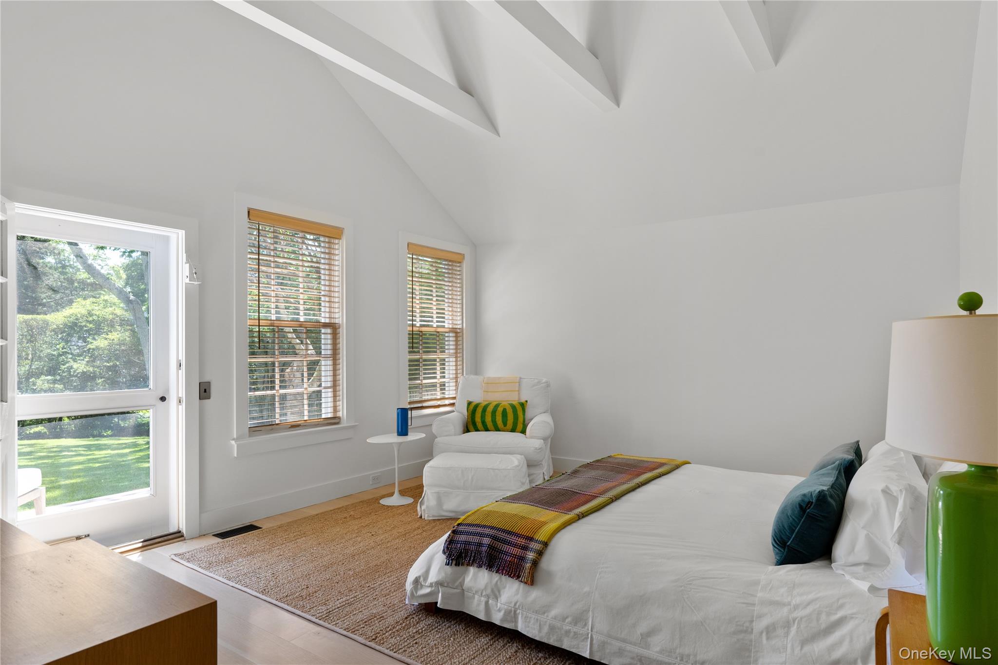 182 Church Lane Bridgehampton, NY 11932 - Photo 21 of 37 a bedroom with a bed and window