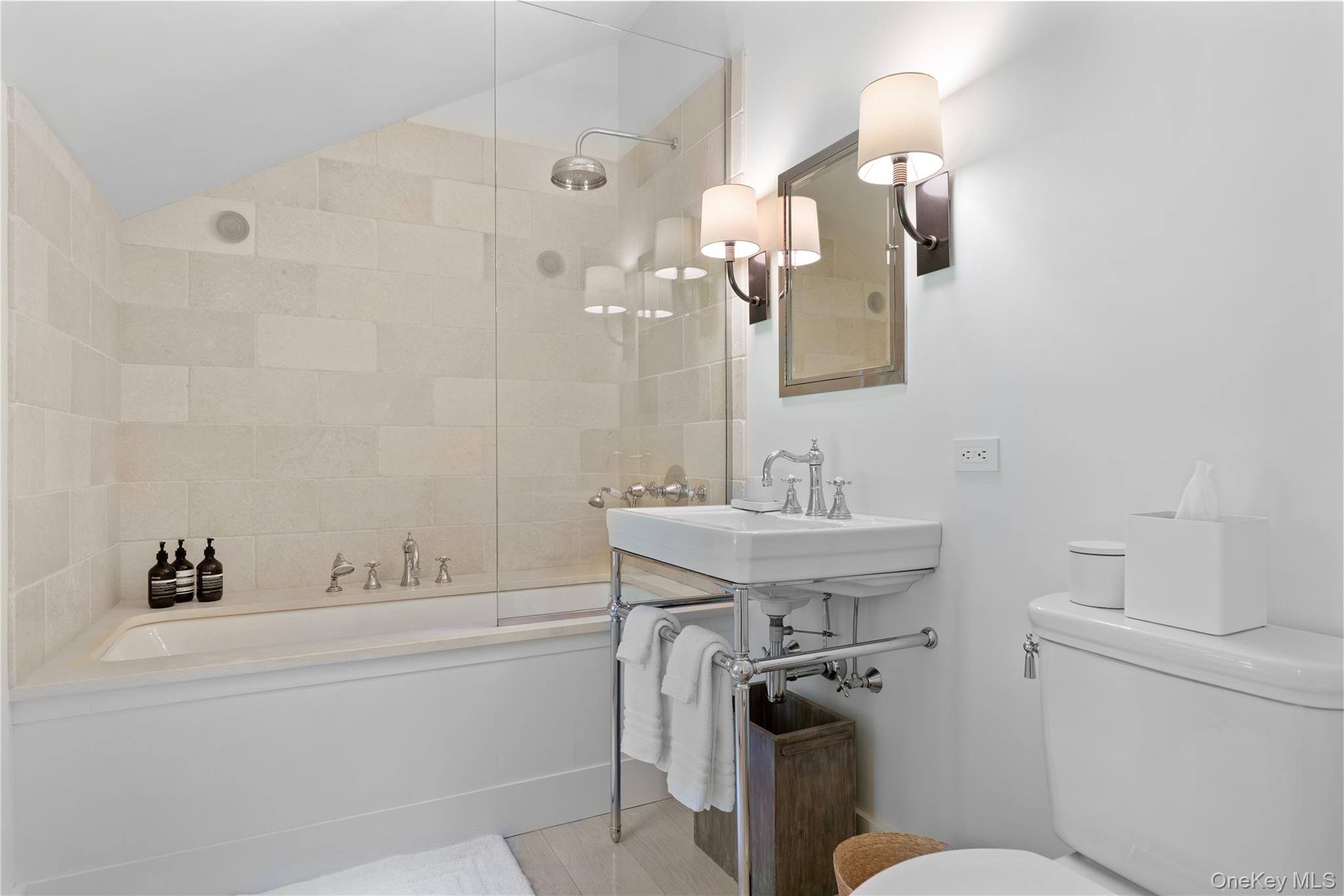 182 Church Lane Bridgehampton, NY 11932 - Photo 23 of 37 a bathroom with a sink a toilet and shower