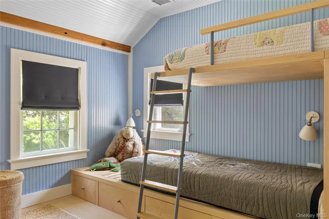 a view of swimming pool with chairs