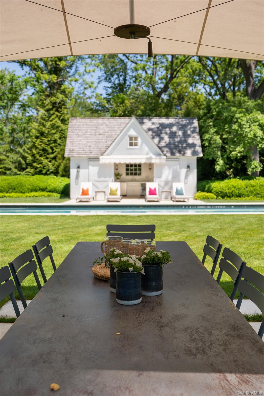 182 Church Lane Bridgehampton, NY 11932 - Photo 35 of 37 a view of a swimming pool with a yard