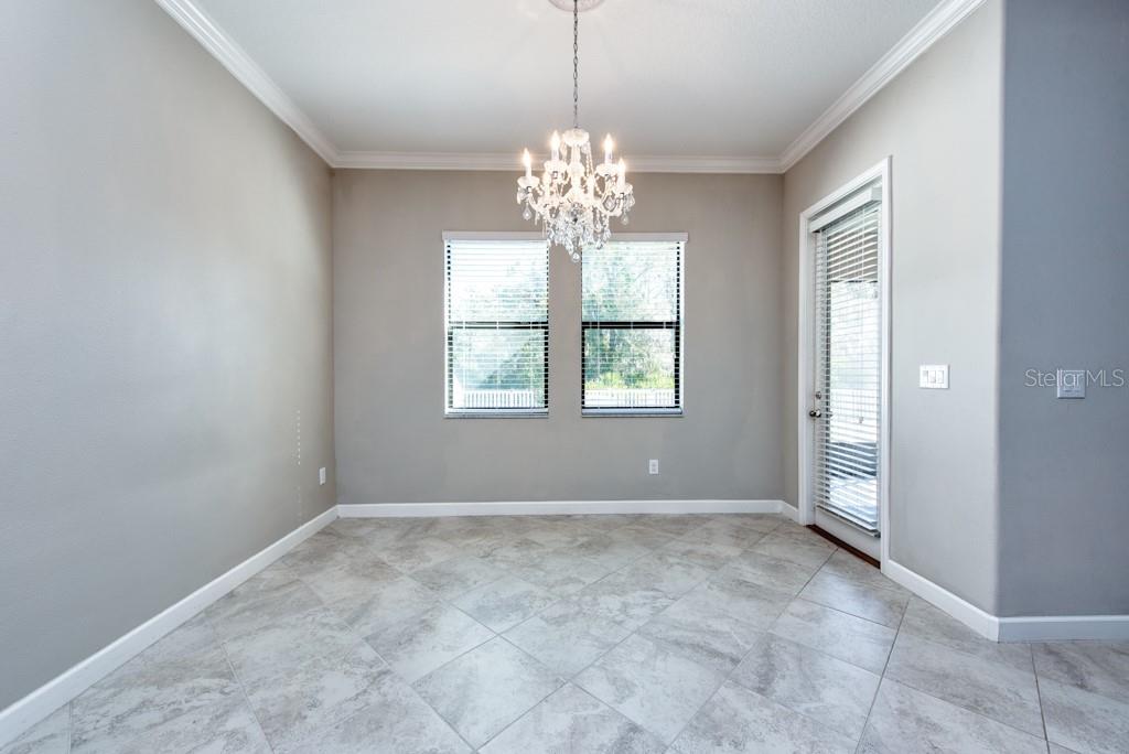 13315 Orca Sound Drive Riverview, FL 33579 - Photo 12 of 52 a view of an empty room with a window