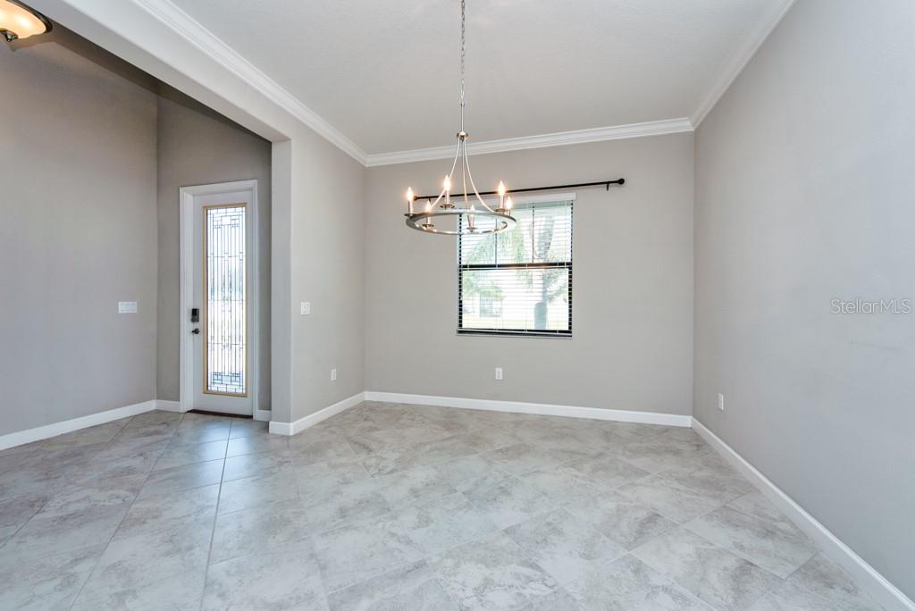 13315 Orca Sound Drive Riverview, FL 33579 - Photo 13 of 52 an empty room that has a window