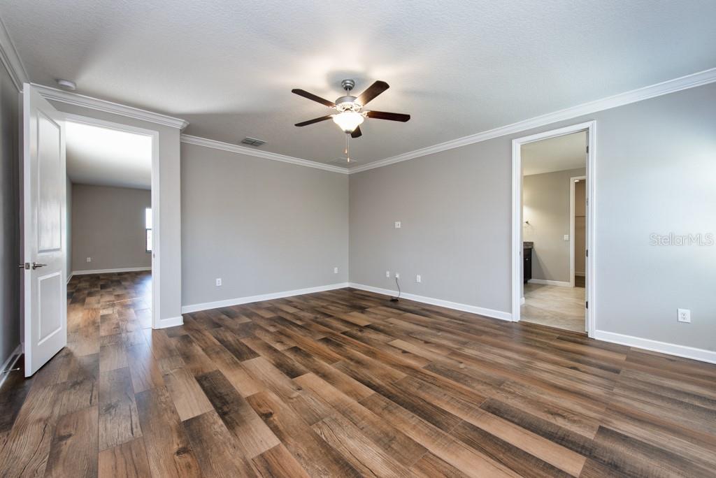 13315 Orca Sound Drive Riverview, FL 33579 - Photo 21 of 52 a view of empty room with wooden floor