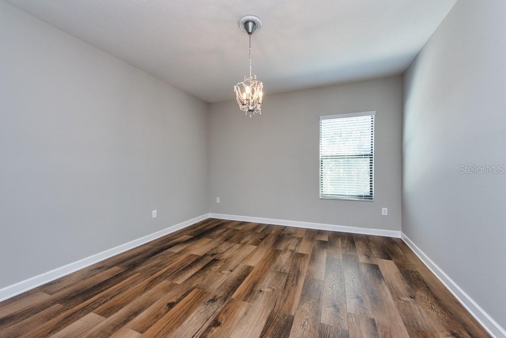 13315 Orca Sound Drive Riverview, FL 33579 - Photo 25 of 52 wooden floor in a empty room