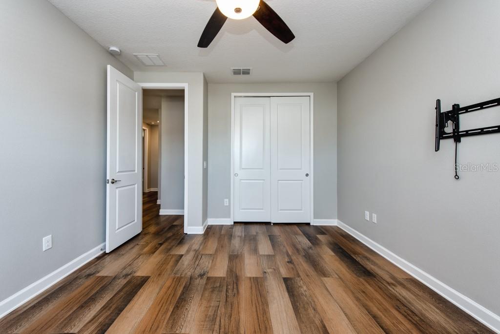 13315 Orca Sound Drive Riverview, FL 33579 - Photo 30 of 52 a view of empty room with wooden floor