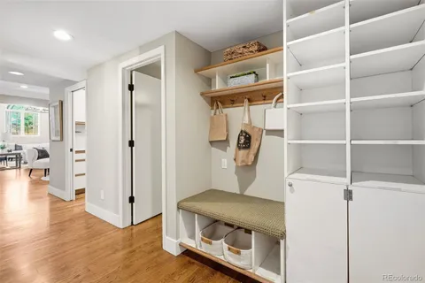 a room with a wooden floor and a chair