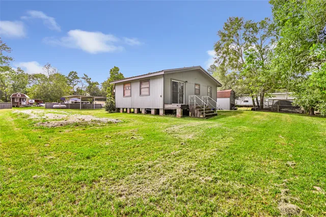$1,000 | 156 County Road 3251W, Cleveland, TX 77327