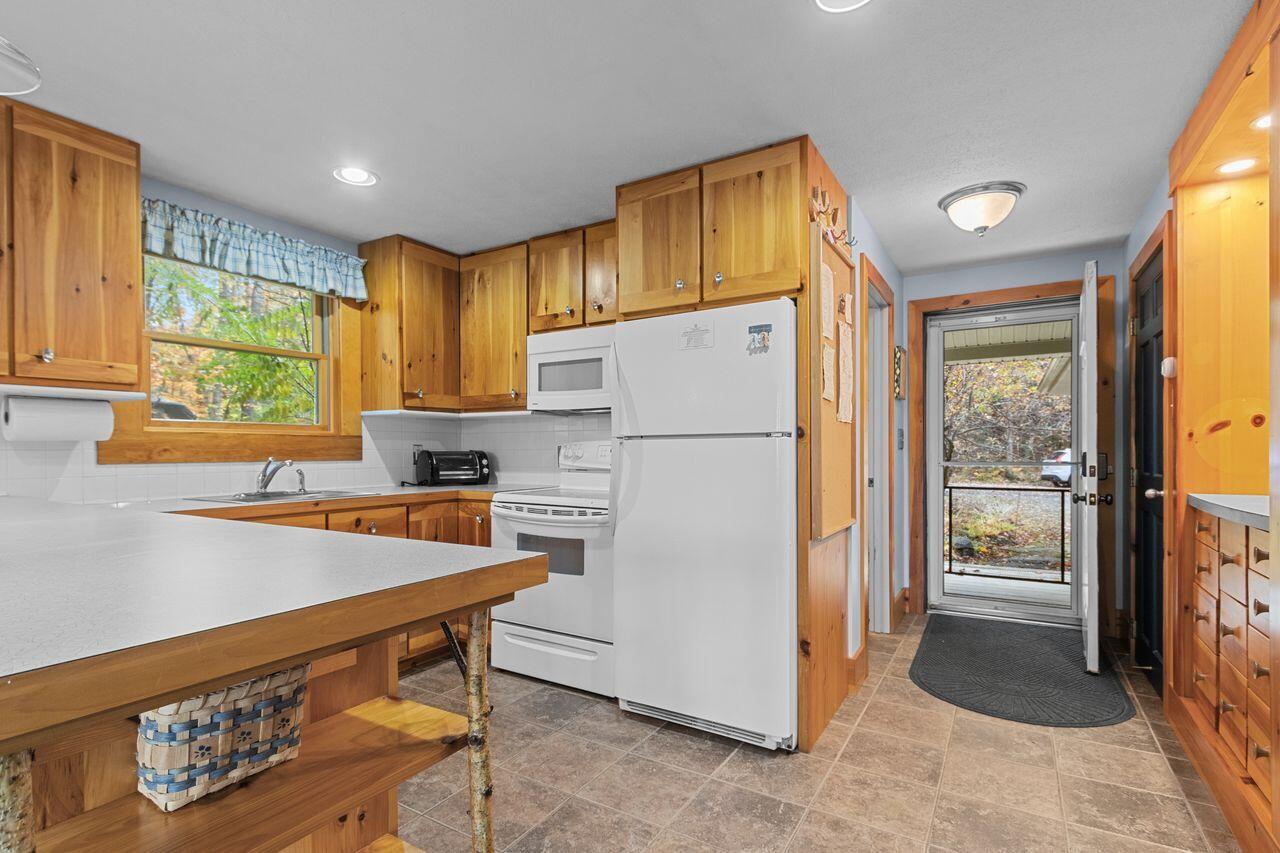 69 Oscar Littlefield Road Lyman, ME 04002 - Photo 11 of 77 Front hall & kitchen