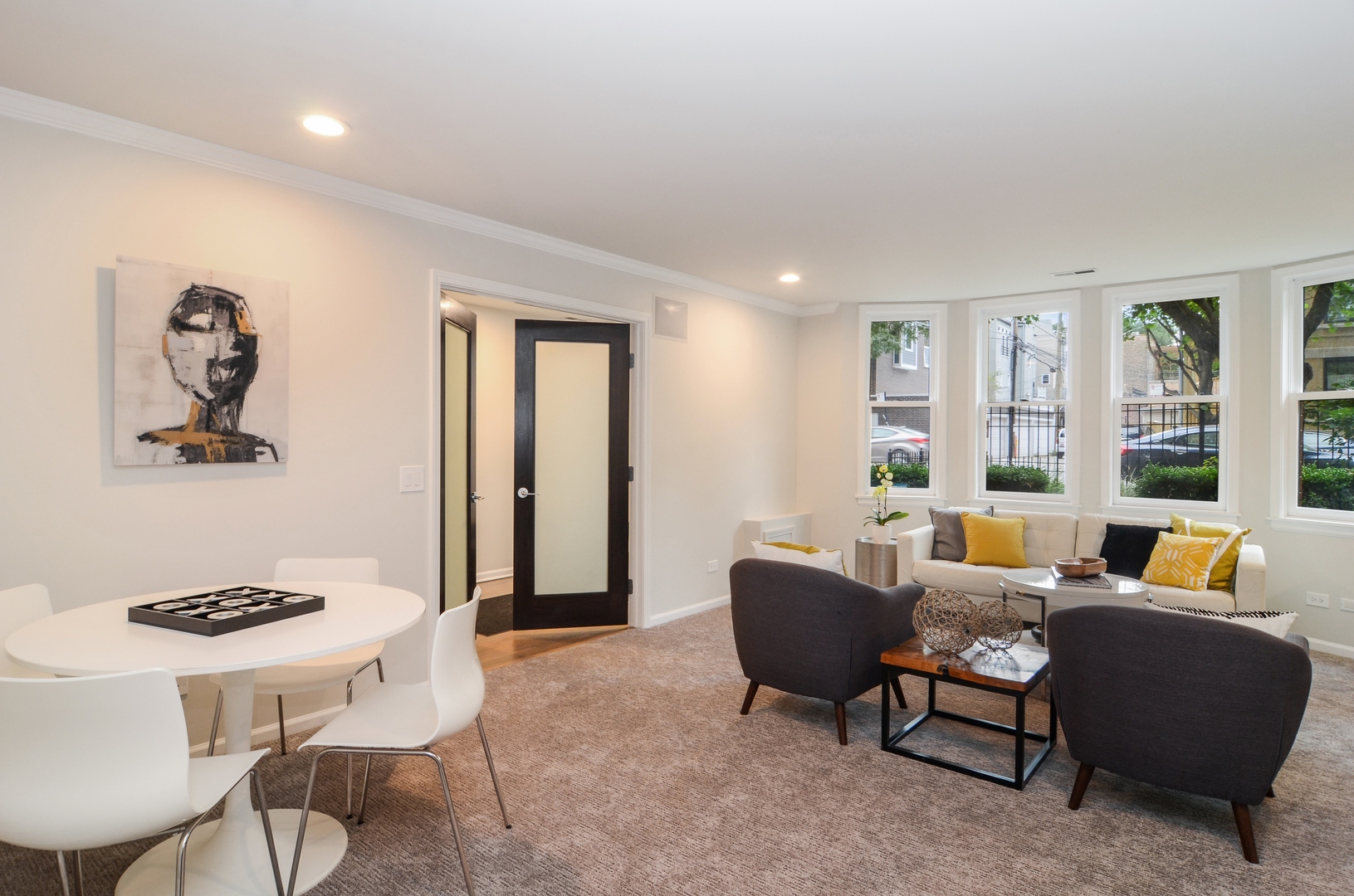 1014 West Grace Street Chicago, IL 60613 - Photo 14 of 24 a living room with furniture and a large window