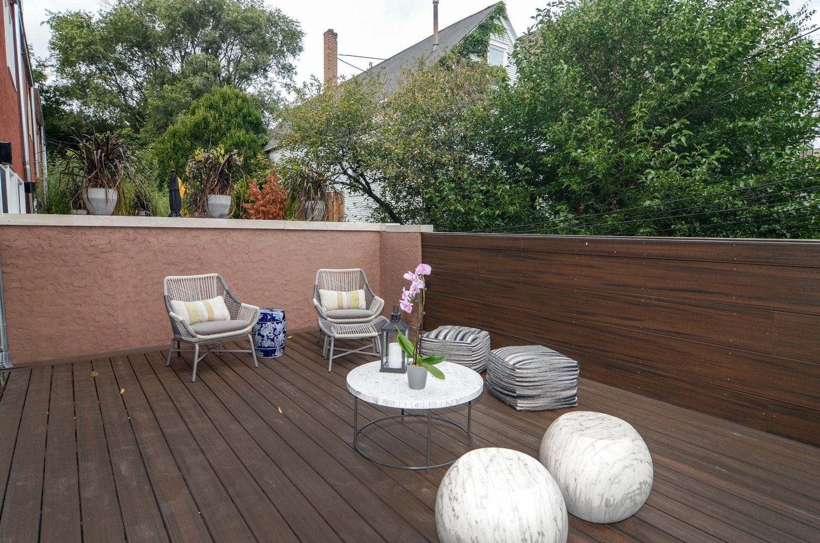 1014 West Grace Street Chicago, IL 60613 - Photo 24 of 24 a backyard of a house with table and chairs