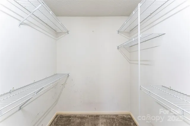 a view of small space with racks on the wall