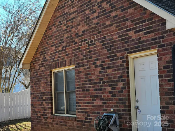 a brick building with a door