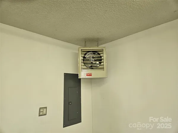 a view of a room with an empty space