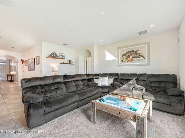 a bedroom with a bed and a cabinets