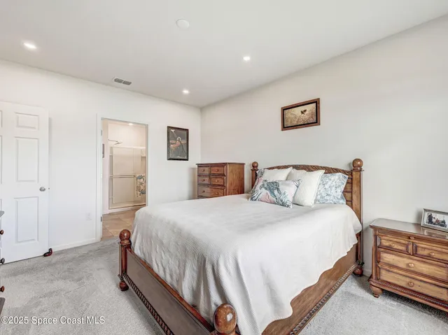 a bathroom with a granite countertop sink mirror and double