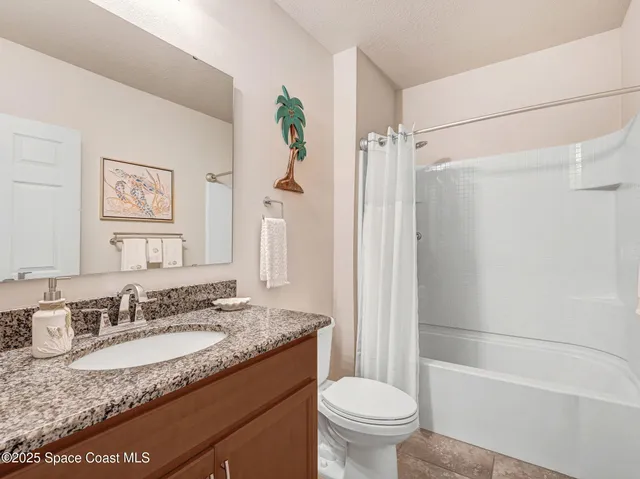 a workspace with furniture and a laptop computer