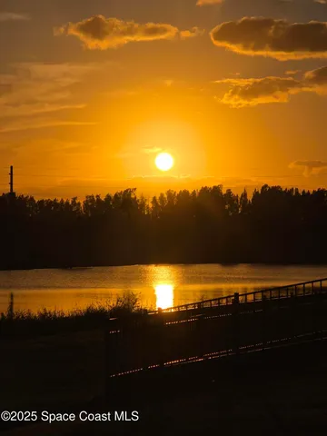 a view of a lake with a big yard