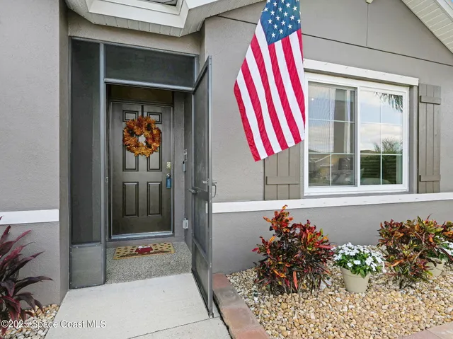 a hallway with a stove and a mirror
