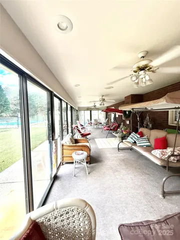 a bedroom with furniture and a dresser