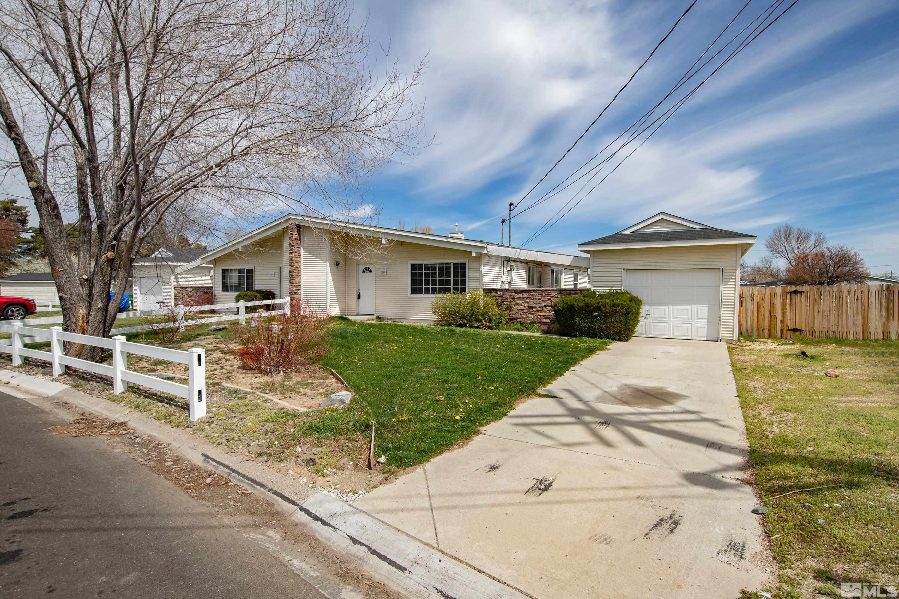 12190 Himalaya Street Reno, NV 89506 - Photo 22 of 34 a view of house with yard