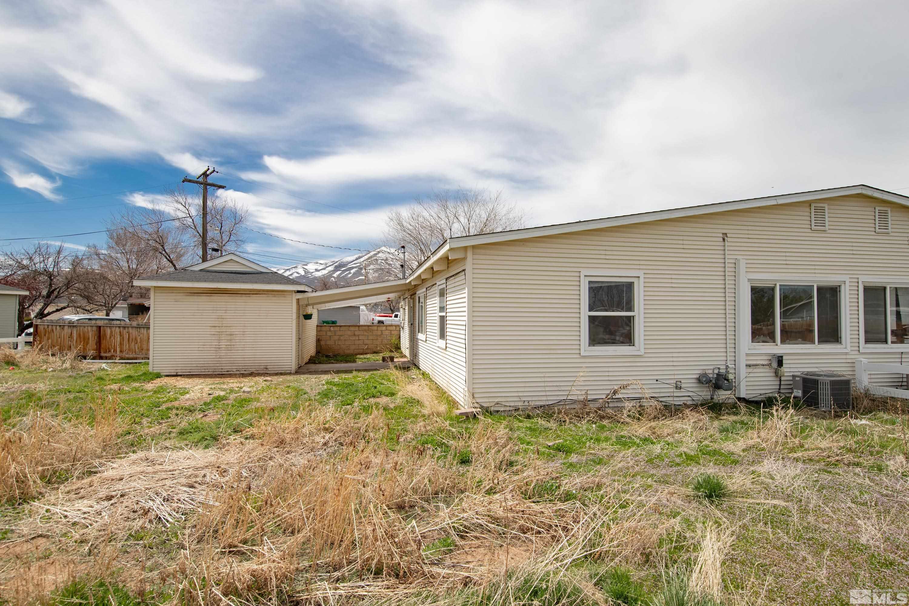 12190 Himalaya Street Reno, NV 89506 - Photo 27 of 34 a view of a house with backyard
