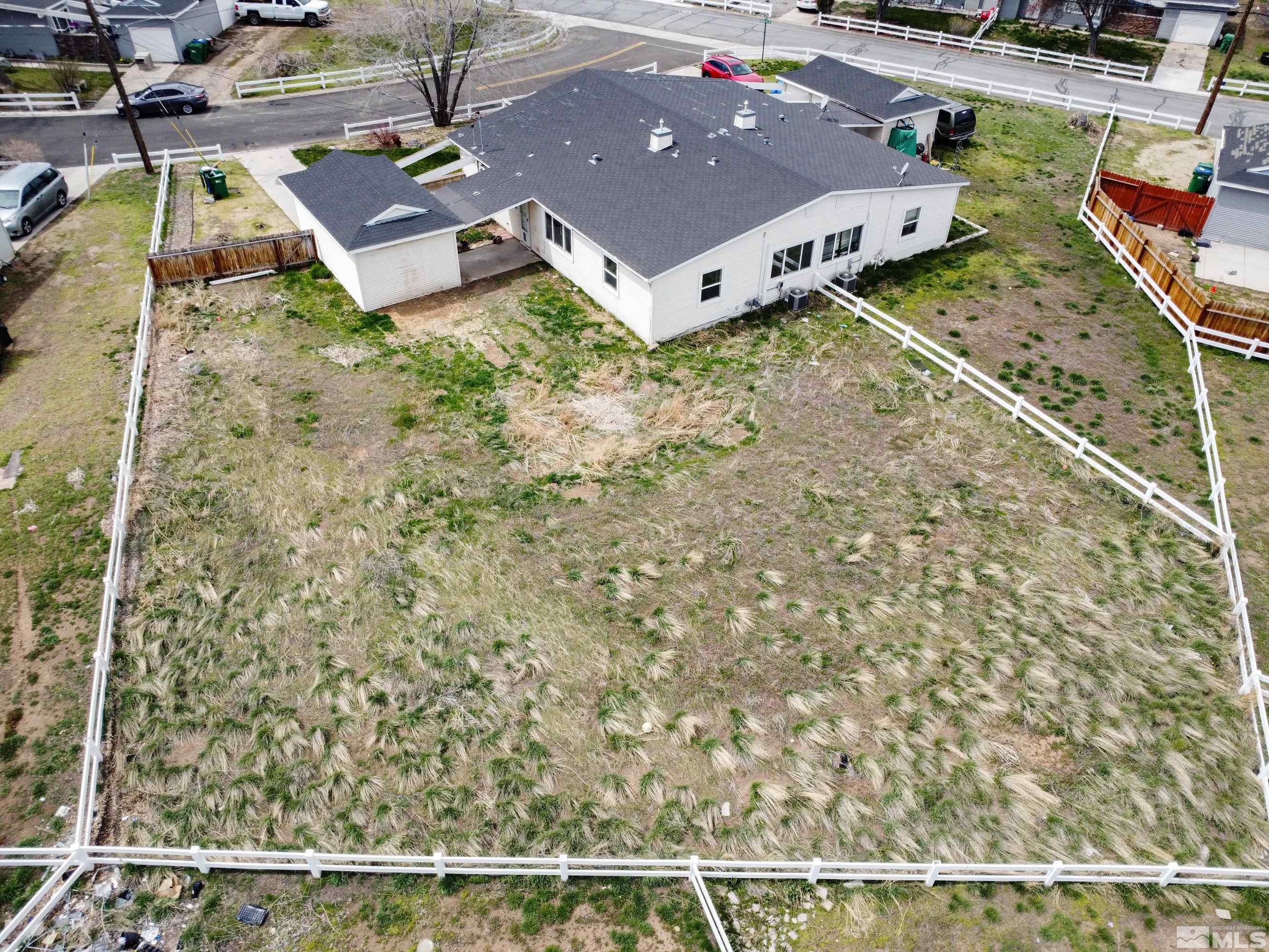 12190 Himalaya Street Reno, NV 89506 - Photo 31 of 34 an aerial view of a house with a yard