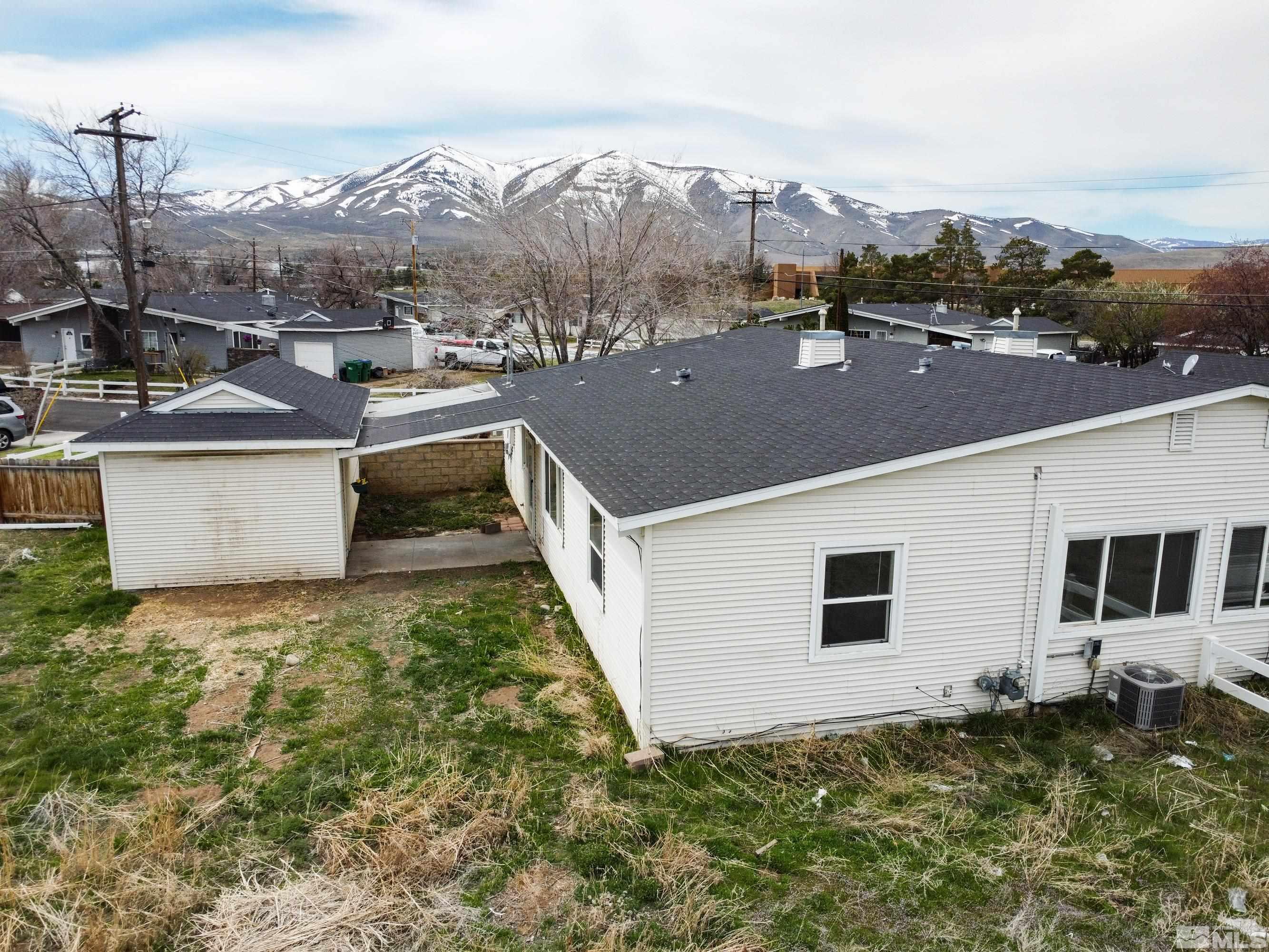 12190 Himalaya Street Reno, NV 89506 - Photo 32 of 34 a view of a house with a outdoor space