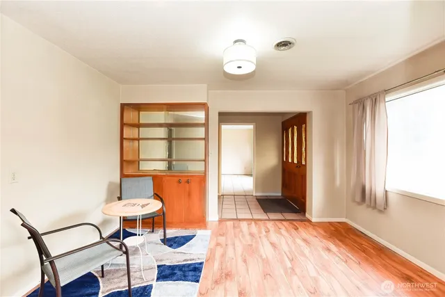 a view of a livingroom with furniture and window