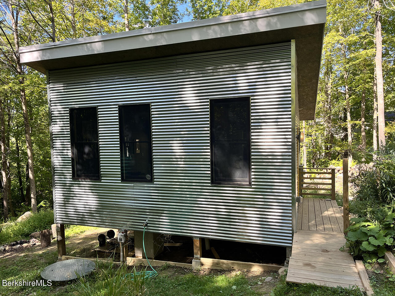 447 Notch Road North Adams, MA 01247 - Photo 12 of 16 a view of a house with a yard and stairs