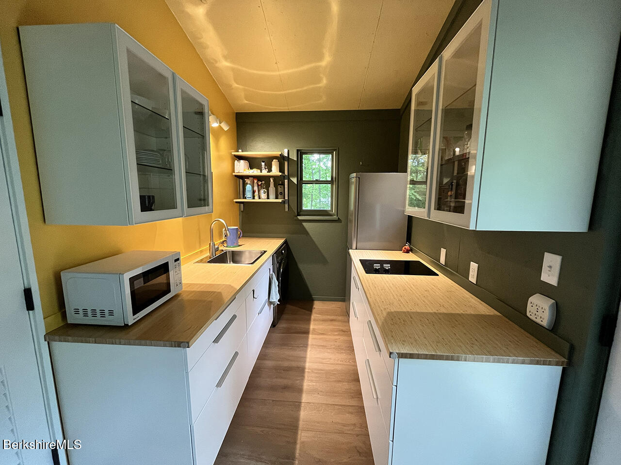 447 Notch Road North Adams, MA 01247 - Photo 6 of 16 a kitchen with stainless steel appliances a stove a microwave a sink and a refrigerator