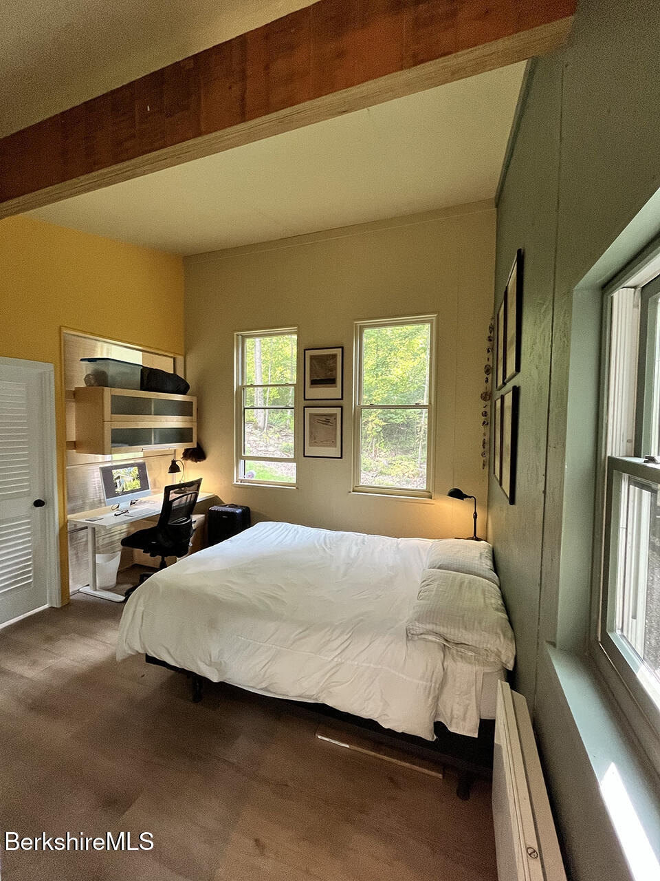 447 Notch Road North Adams, MA 01247 - Photo 9 of 16 a bedroom with a bed and wooden floor