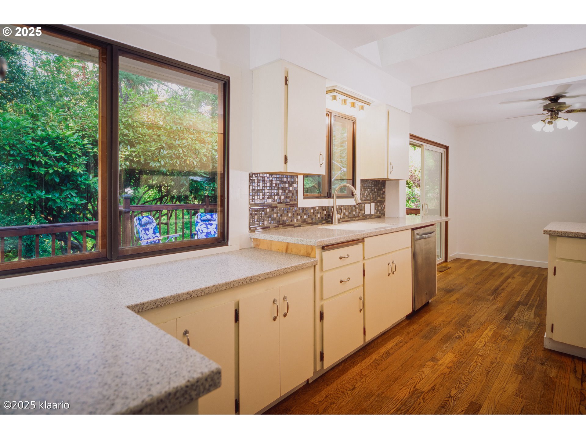 3691 Ridgewood Way West Linn, OR 97068 - Photo 11 of 34 a large white kitchen with a large window