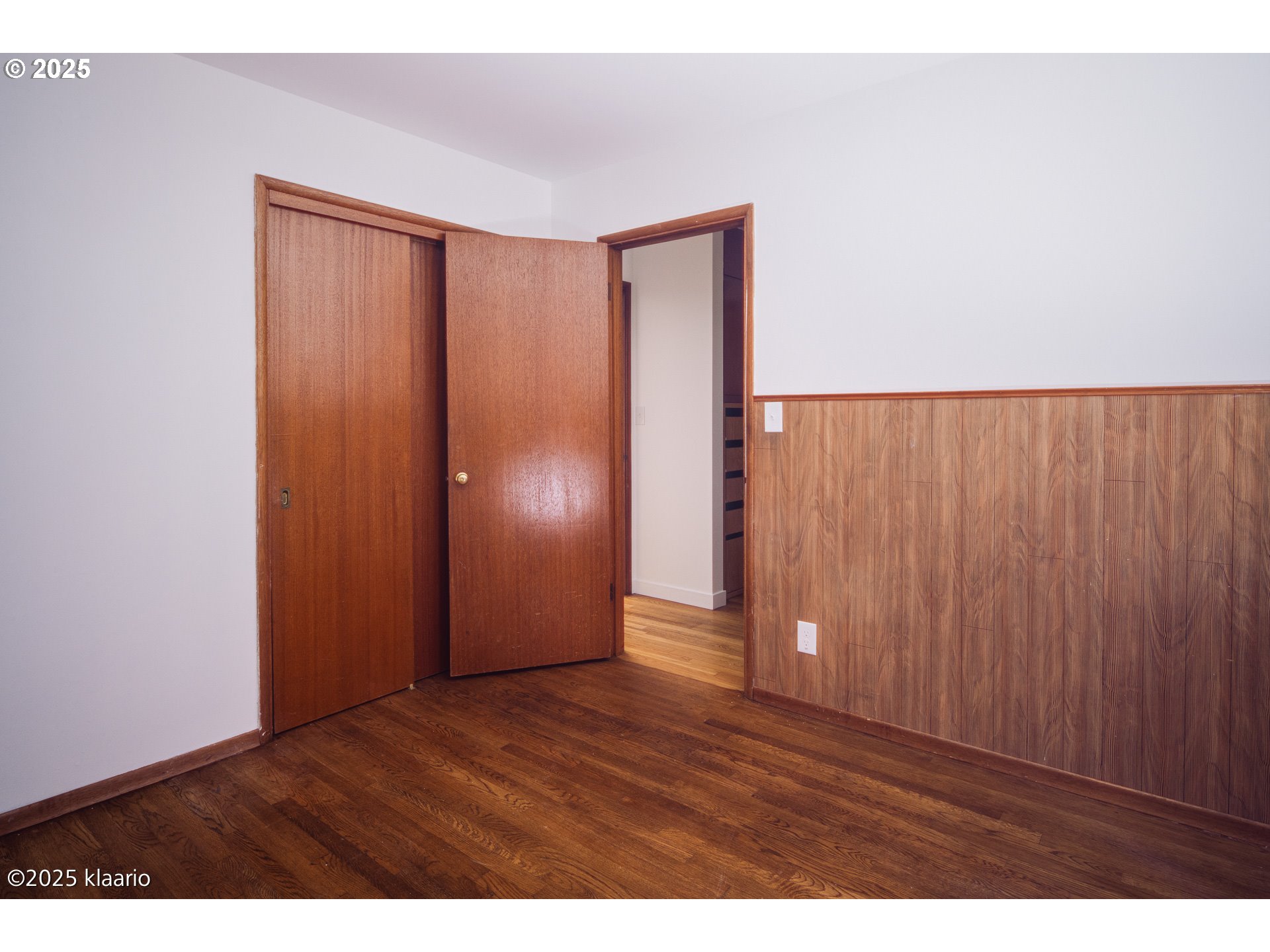 3691 Ridgewood Way West Linn, OR 97068 - Photo 15 of 34 a view of an empty room with wooden floor