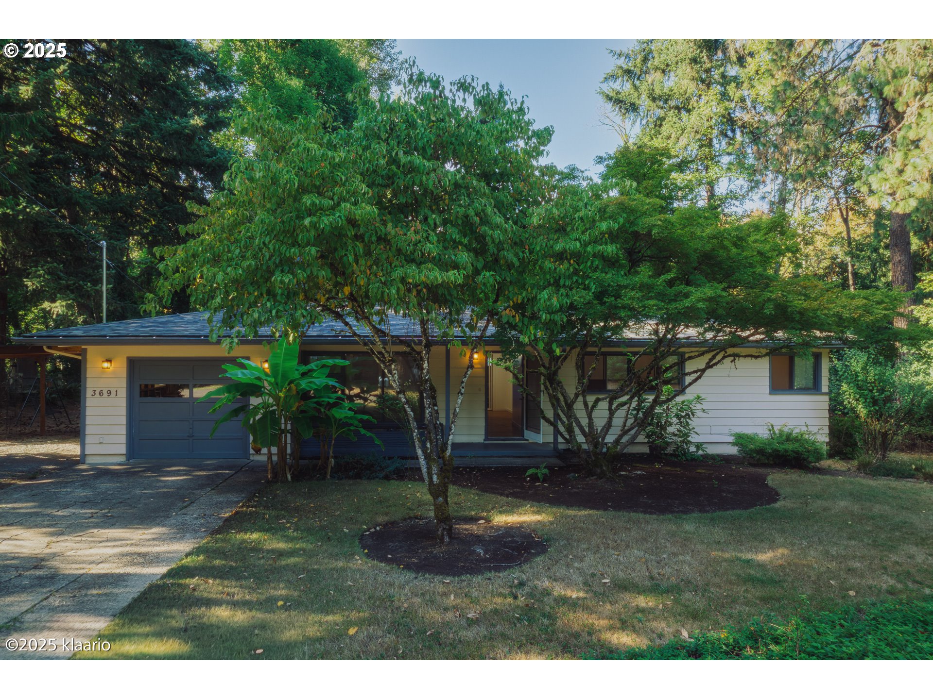 3691 Ridgewood Way West Linn, OR 97068 - Photo 17 of 34 a backyard of a house with lots of green space