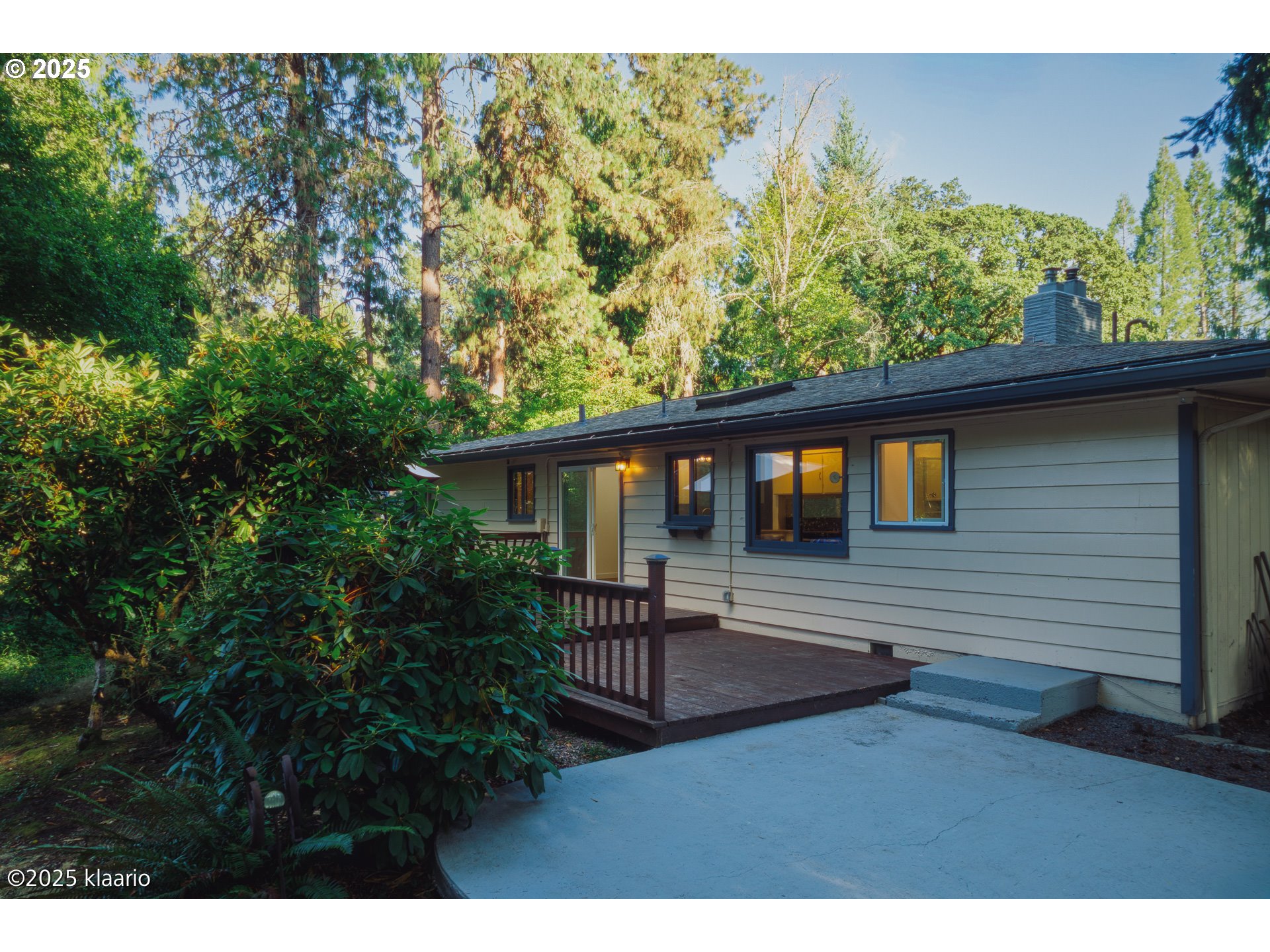 3691 Ridgewood Way West Linn, OR 97068 - Photo 22 of 34 a front view of a house with garden