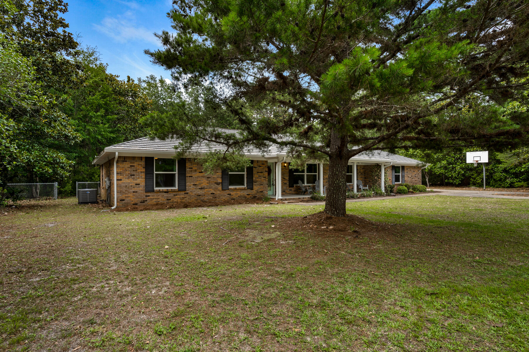 665 Brookhaven Way Niceville, FL 32578 - Photo 3 of 49 a front view of a house with a garden