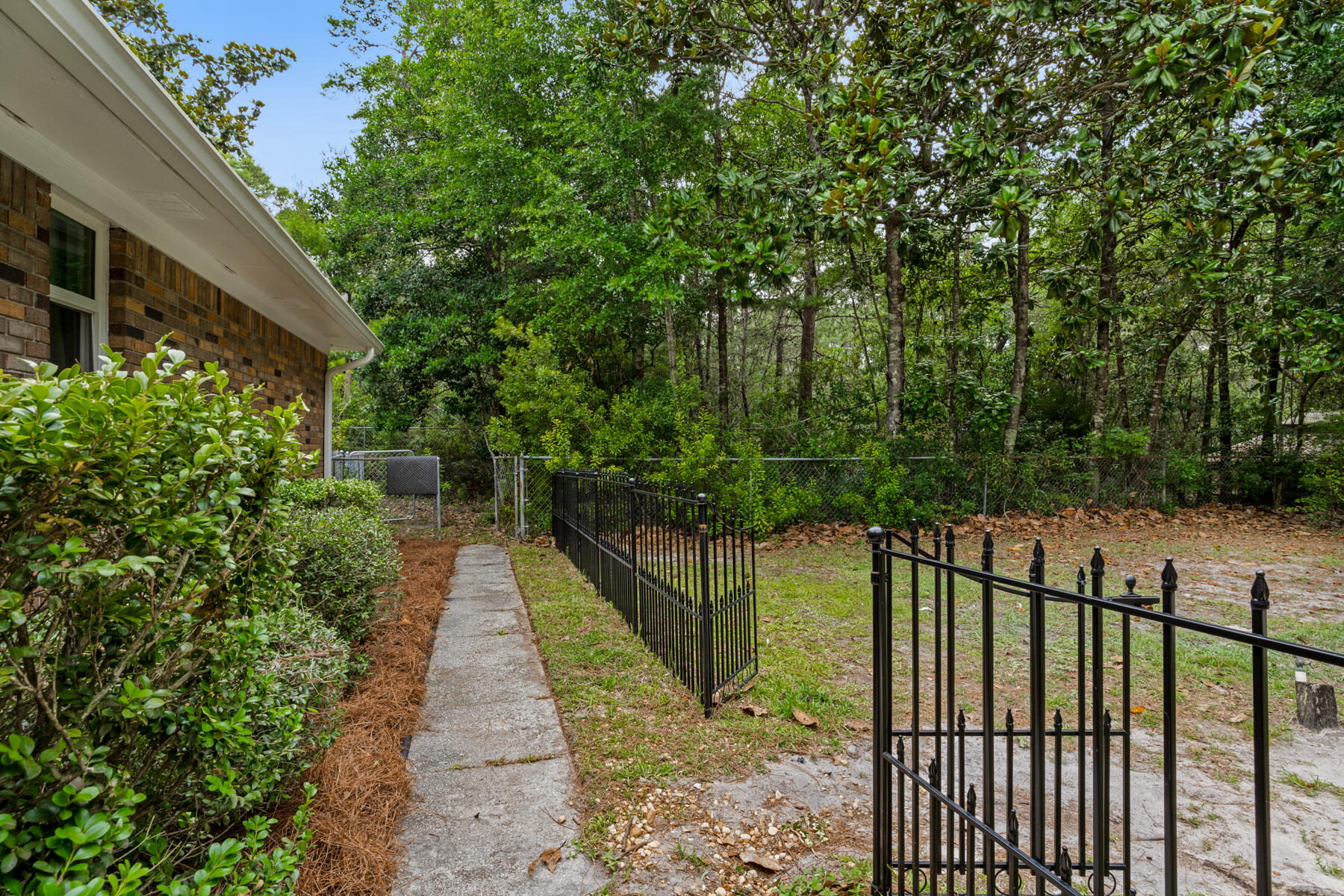 665 Brookhaven Way Niceville, FL 32578 - Photo 40 of 49 a balcony with trees in front of it