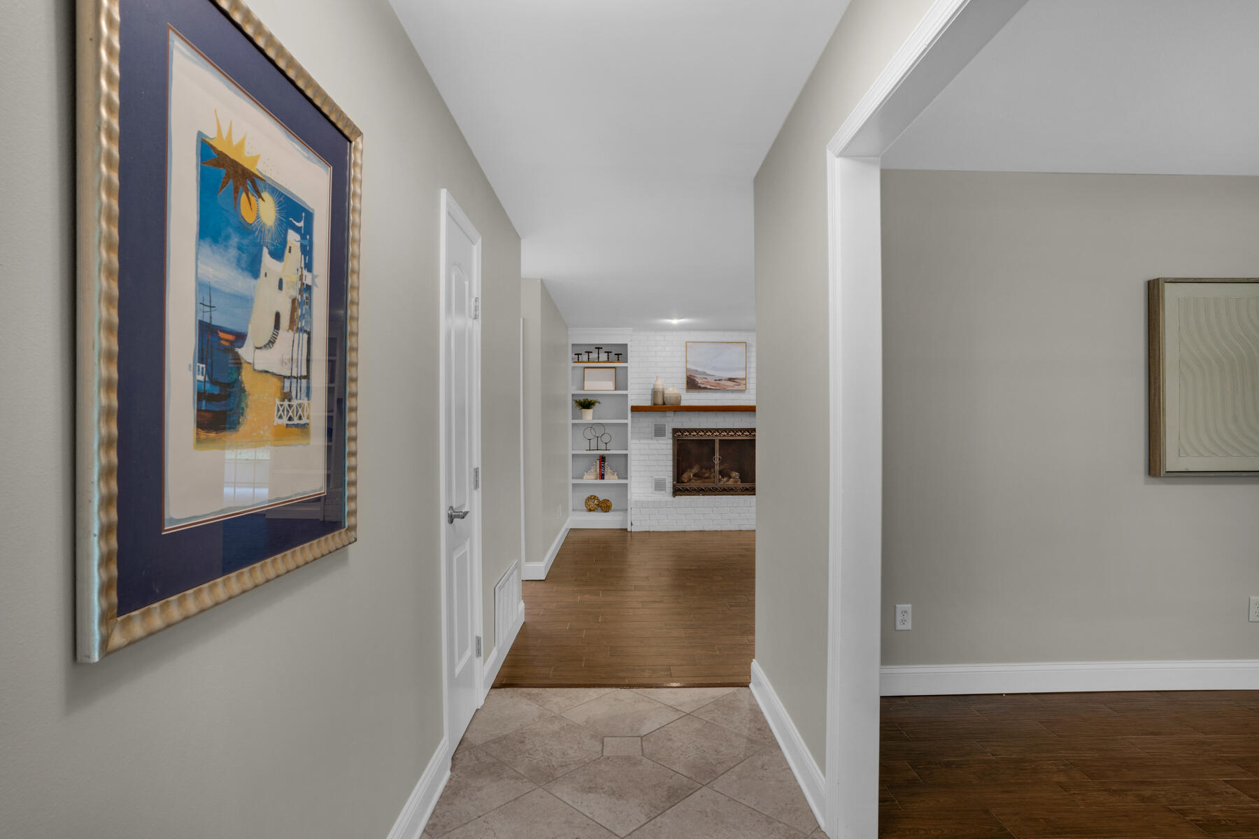 665 Brookhaven Way Niceville, FL 32578 - Photo 7 of 49 a view of a hallway with wooden floor and living room